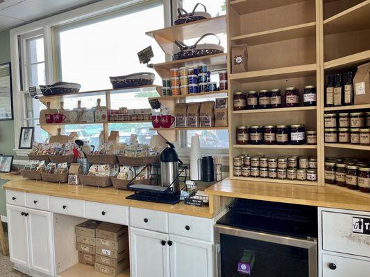 Inside of shop - condiment station and they also sell other food and non-food kitchen/gift products