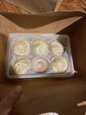 "Soup dumplings" pure authentic Asian cuisine right here. Directly from the frozen package they were microwaved from. Seriously.  Unreal.