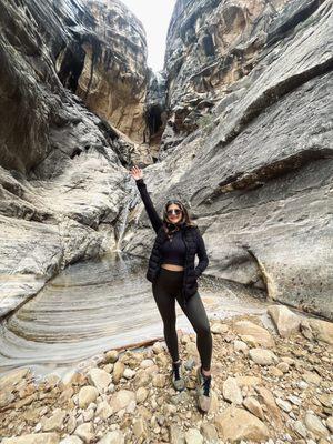 Mountains, rocks, waterfall, female hiker.