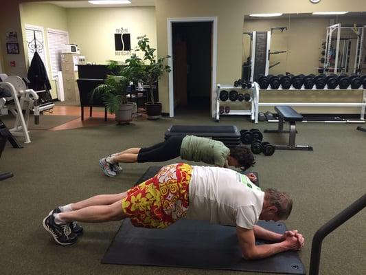 Jim and Liz holding a 4.5 minute plank