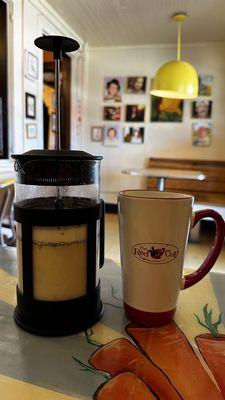 Quiet corner with a personal pot: Earl Grey Oat Milk Latte with Lavender Syrup