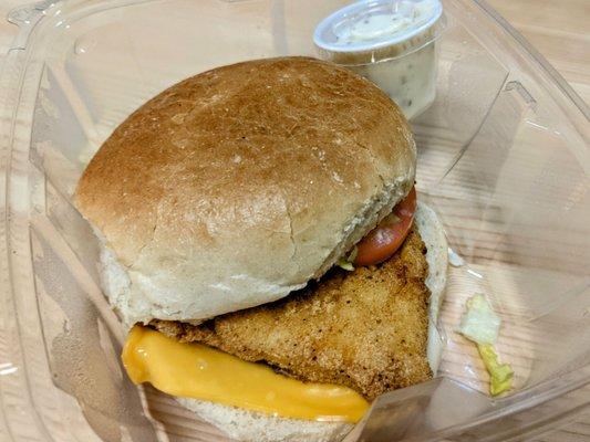 Solo Fish Whopper with a side of tartar sauce.