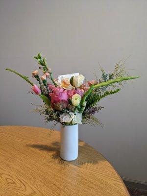 Sweetheart Arrangement, $65. Roses, ranunculus, hellebores, sweet peas, ferns in shades of pink, blush, cream. Plus $20 delivery, $6.83 tax.