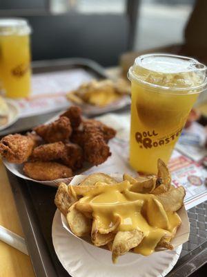 Wings and cheese fries, with a side of orangade