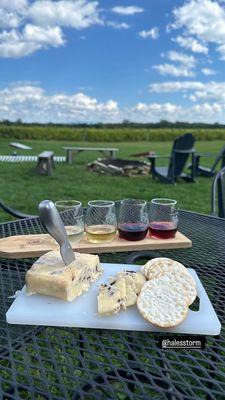 Wine flight with blueberry windsordale Vermont cheddar cheese