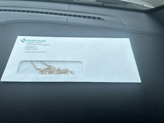 My chain in the envelope they saved for me.