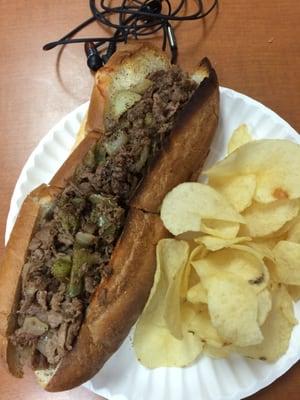 small steak & cheese w/ peppers, onions, salt & pepper on toasted sub roll