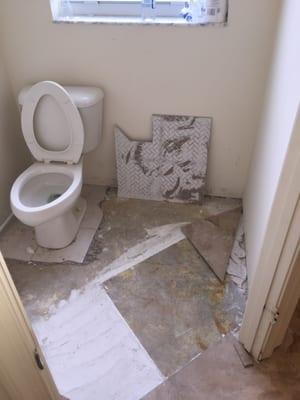 Tiles peeling off floor