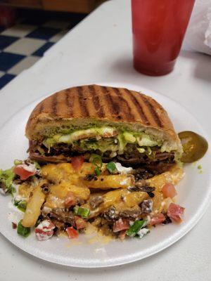 1/2 torta Cubano and some yummy asada fries. Sinfully delicious!