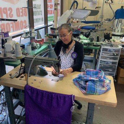 Our seamstress with over 20 years of experience