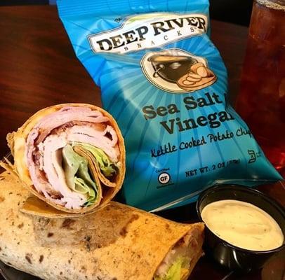 Our Club Wrap with one of our five homemade sauces!