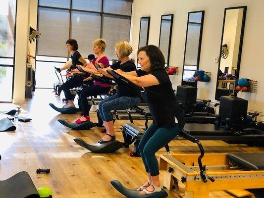 Our Pilates classes utilizing the Oov and Konnector straps to enhance movement - both unique to our clinic for Pilates classes! Glendale, AZ