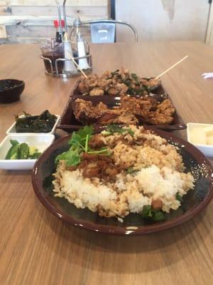 Rice with pork chop and popcorn chicken.