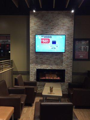 The fireplace and tv area