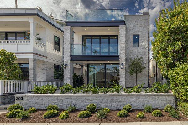 New construction, stone veneer, landscape and hardscape concrete.