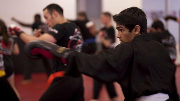 Our teen & adult MMA classes teach real self-defense and fighting skills, and get you in amazing shape.