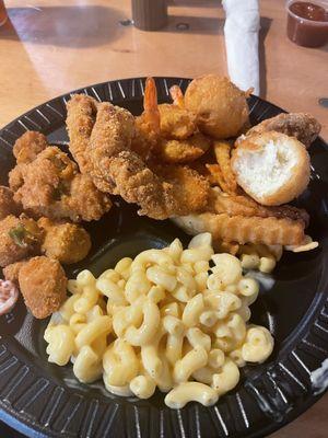 Fried okra, Mac and cheese, fried cat fish, shrimp, and fabulous hush puppies