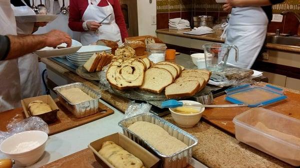 sampling delicious breads while waiting for our own to rise