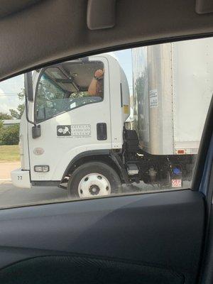 This truck was holding up traffic, couldn't figure out why. Got closer. Saw the passengers....