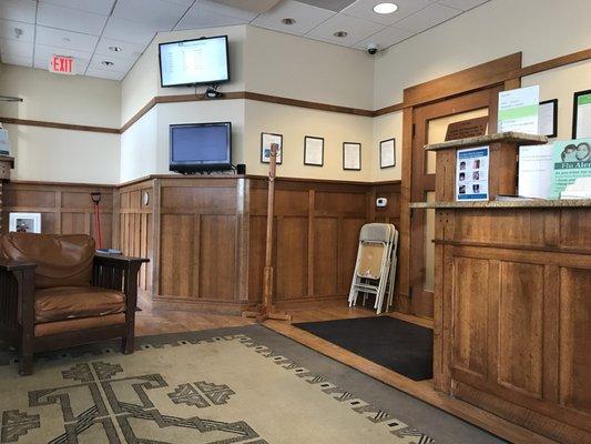 Waiting area with a visible screen showing your place in line.