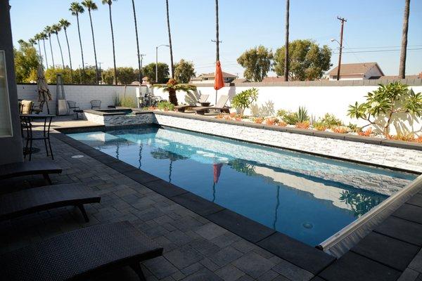 East Long Beach Pool and Spa built this pool and spa. Our pool construction builders also built the deck and planters.