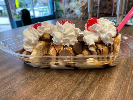 PB Temptation. Vanilla ice cream, chocolate and  peanut butter sauce, PB buckeyes, whip & cherry!