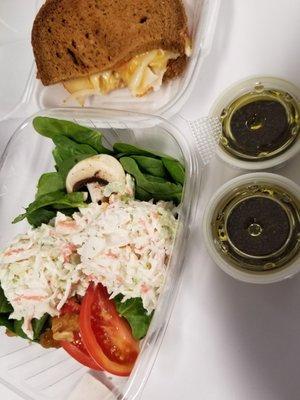 Spinach salad with 2 scoops of seafood salad and a Turkey melt on wheat.