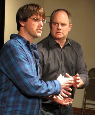 Michael Davenport and Andrew Pearce performing at Magic Jester Theater.