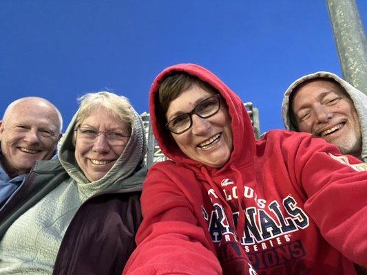 (left to right:) Yankees fan, Mets fan, Cubs fan (wearing a Cardinals t-shirt because it turns him on), Cardinals fan.