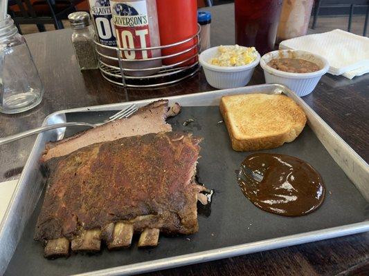 Ribs,brisket jalapeño corn and pinto beans with brisket