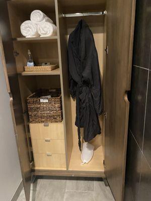 Locker (located inside massage room) shower is located on other side - there is a sliding door to block light during service