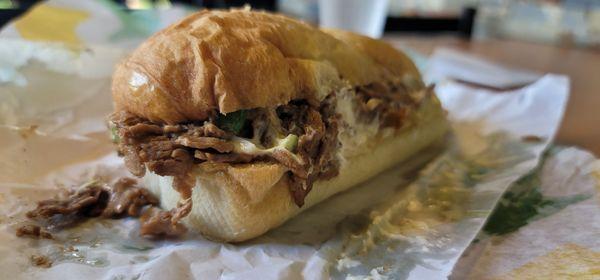 Steak & Cheese. Additional toppings on the bread: mayo, mustard, jalapeño, black pepper, and oil.