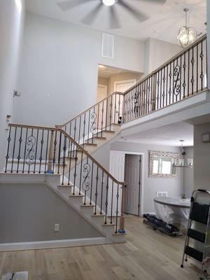 Custom Stair Case
 White Oak Treads and Handrails Stained to Match Waterproof Hardwood LVP