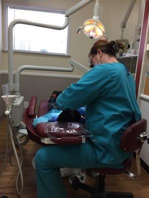 Awesome dental hygienist Rachel cleaning my little guy's teeth.