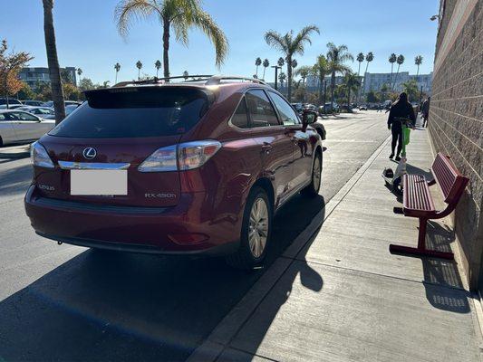 I was advised to park in front of the red bench for my return vehicle torque check (sans appointment).