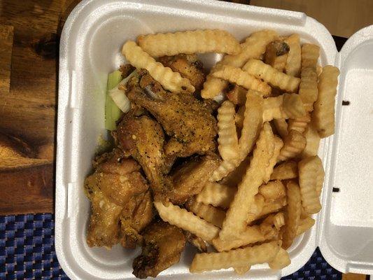 10 wings (dry lemon pepper rub), fries and canned drink.