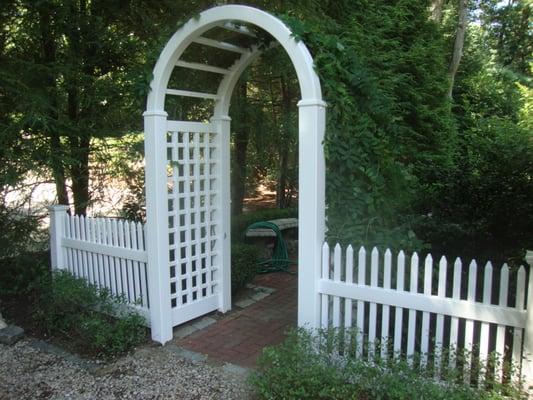 White vinyl arbor.