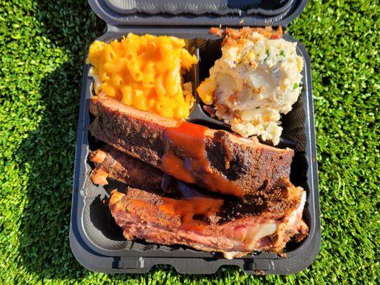 ribs with mac n' cheese and loaded potato salad