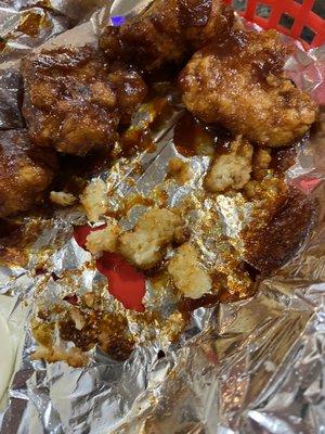 Nasty burnt wings with foil stuck to them all.