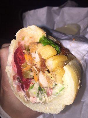 Schnitzel on a baguette w/ fresh veggie toppings