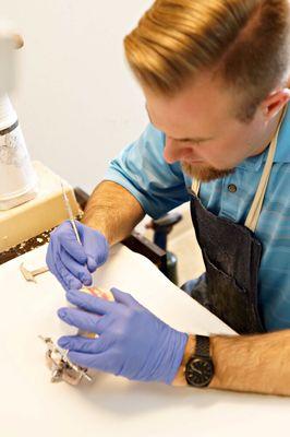 Michael crafting a denture