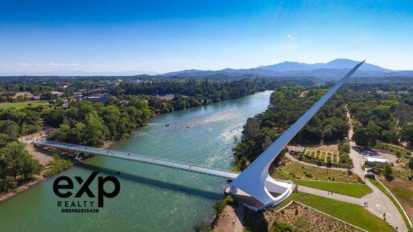 The beautiful Sundial bridge, eXp Realty logo and DRE license number!