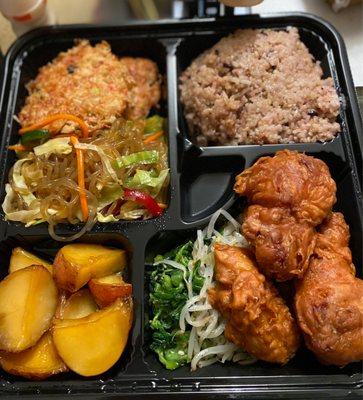 4 item plate w Fried chicken, brown rice, Korean pancake. Japjae, & braised potatoes, yum!