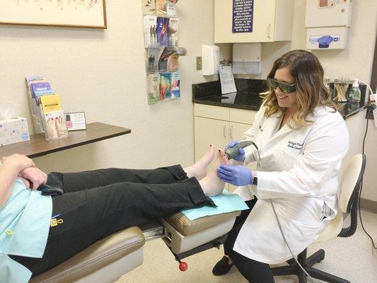 Dr. Alyssa Carroll uses Extracorporeal Shockwave Therapy to treat her patient's plantar fasciitis.