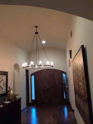 Chandelier Installation. Entry way