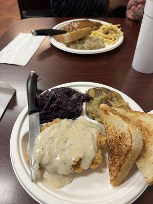 Amazing chicken fried chicken with sweet cabbage and potatoes. My husband had jagerschnitzel with spaetzle and sauerkraut.