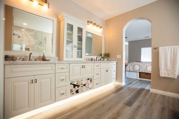 Master bath with Sollid Cabinetry, custom lighting features and Brizo plumbing fixtures