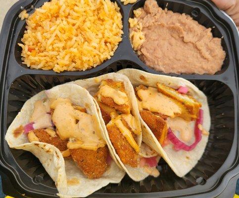 Baja Fish Tacos with refried beans and rice