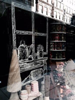 Parisian store front windowed chalk displays