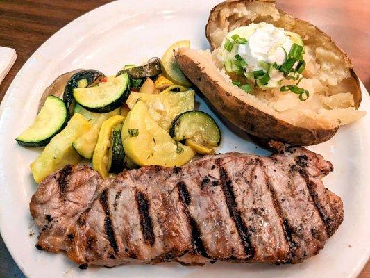 NY steak dinner w/ baked potato